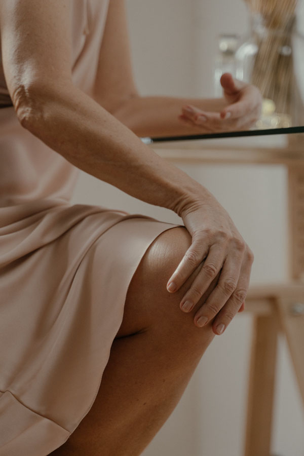 Person massaging their knee